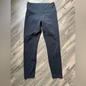 Black leggings, size medium.